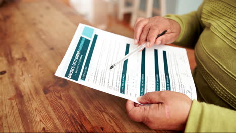 divorce settlement agreement on wooden table