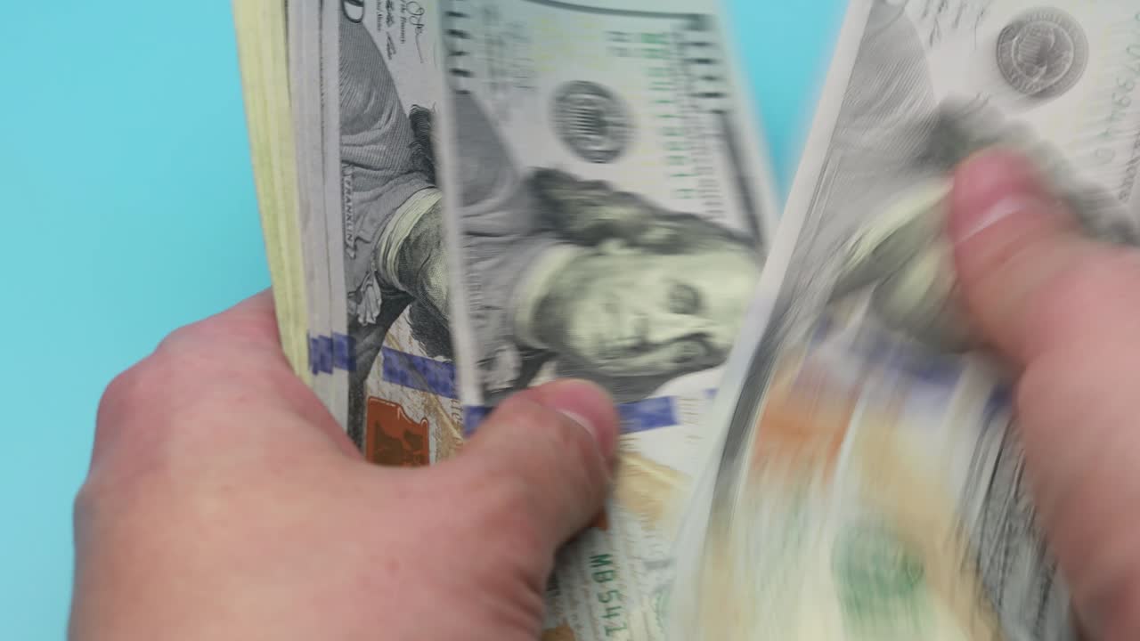 Loop hands count dollars of different years of countries