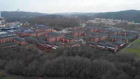 aerial - apartment complex in angered, gothenburg, sweden, lowering wide shot