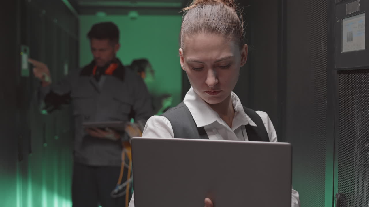 Technicians working in a data center
