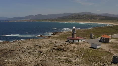 Coastline-at-Corrubedo-and-lighthouse-,-La-Coruna,-Spain
