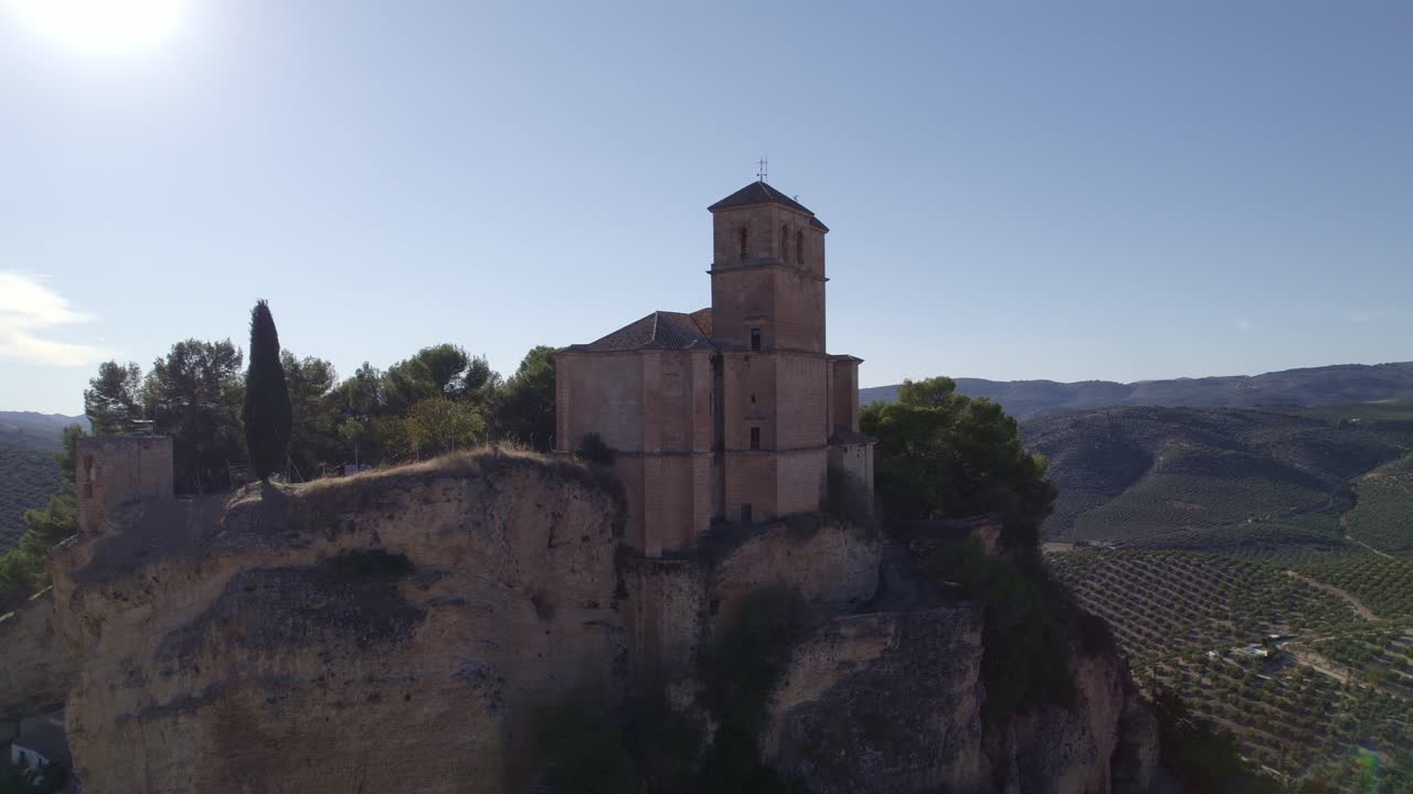 Montefrio. Village Church. Iglesia de la Villa. Church next to cliff. Aerial view of Andalusian town and church on cliff. Montefrio. Andalusia. Spain.