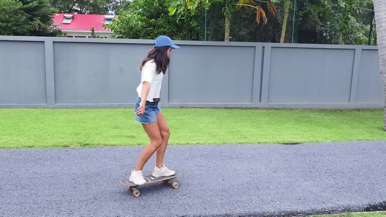 Woman Skateboarding Outdoors