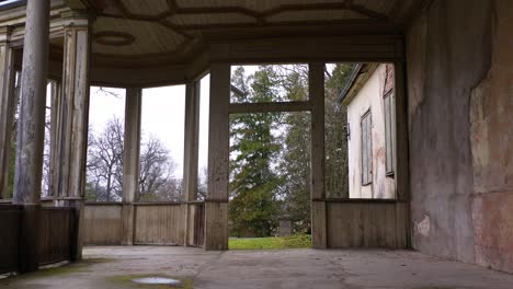 inside of burtnieki manor with no windows, dolly forward view