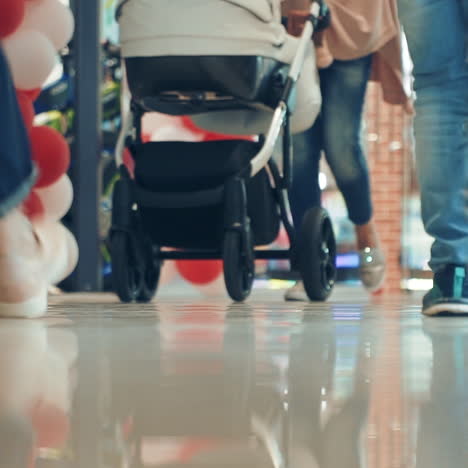 feet of people walking in mall. shopping time. close-up square video
