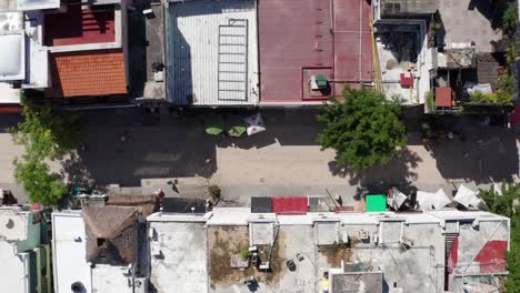bird's eye aerial dolly shot looking down at la quinta avenida in downtown playa del carmen, mexico