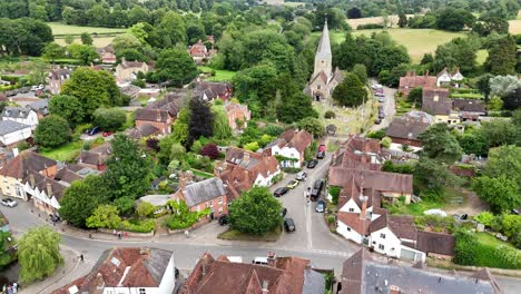 shere surrey uk quaint english village pull back drone aerial reverse reveal