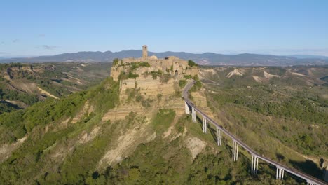 beautiful drone flight over civita di bagnoregio on typical summer day in lazio