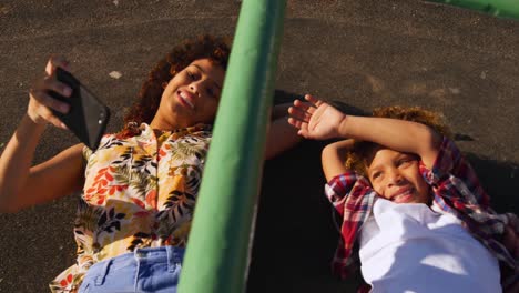 mother and son having fun at playground