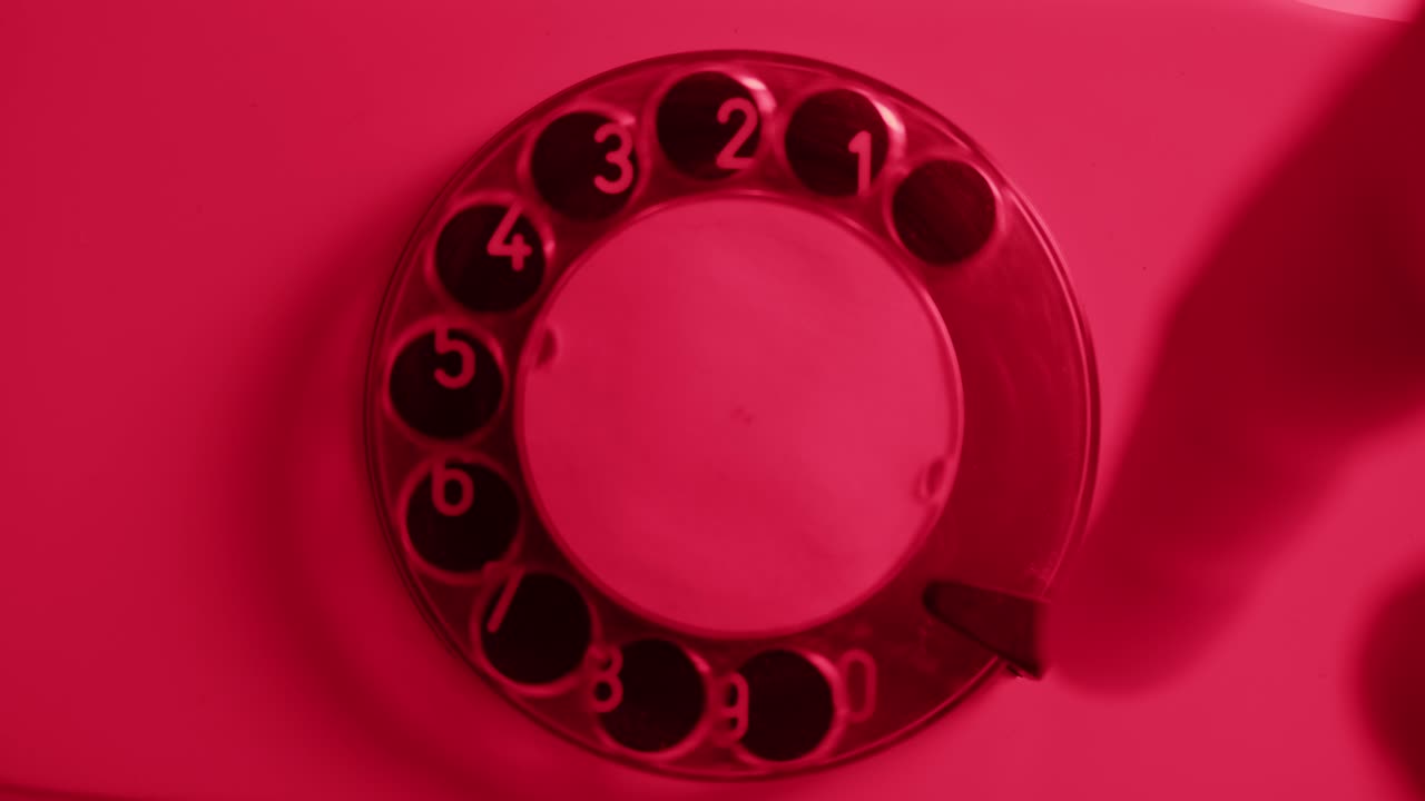 Retro vintage phone, A yellow rotary telephone is displayed on a wooden desk, adding a nostalgic touch