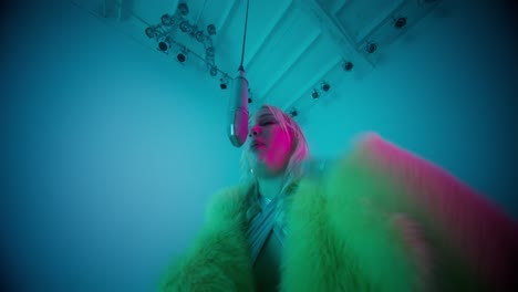 singer in neon studio