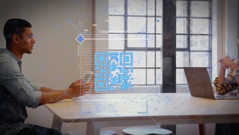 Animation-of-qr-code-with-data-over-diverse-business-people-in-office