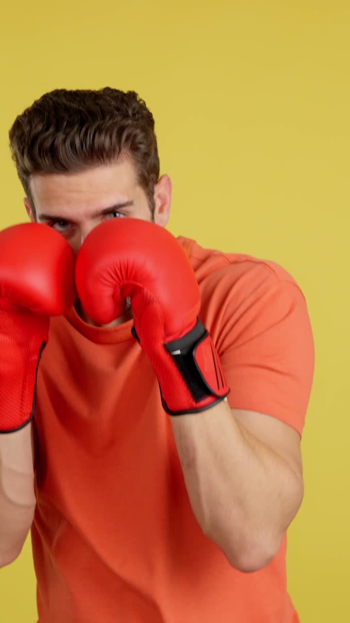 Man in Red Boxing Gloves Ready to Fight