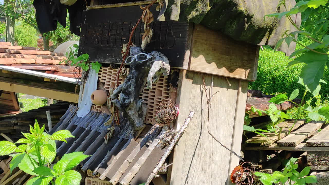 Funny home-made DYI insect hotel, closeup shot.