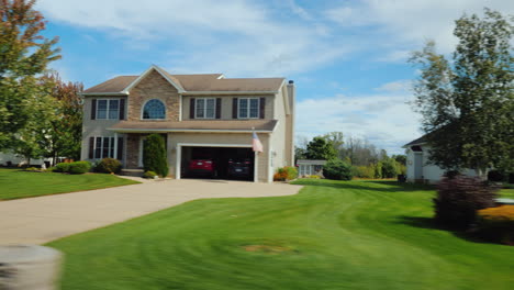 Ride-Along-Typical-American-Suburbs-View-From-The-Window-Of-The-Car---Visible-White-Wooden-Houses-An