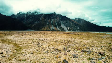 Mount-Cook-National-Park,-New-Zealand-Drone-of-Mountains-and-Stream