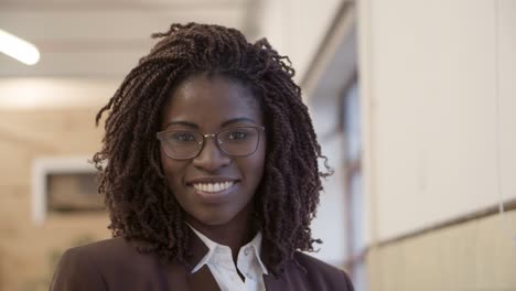 Confident-African-American-businesswoman-looking-at-camera