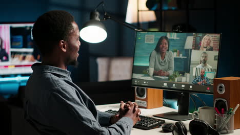 young black man making a video call executive meeting with colleagues