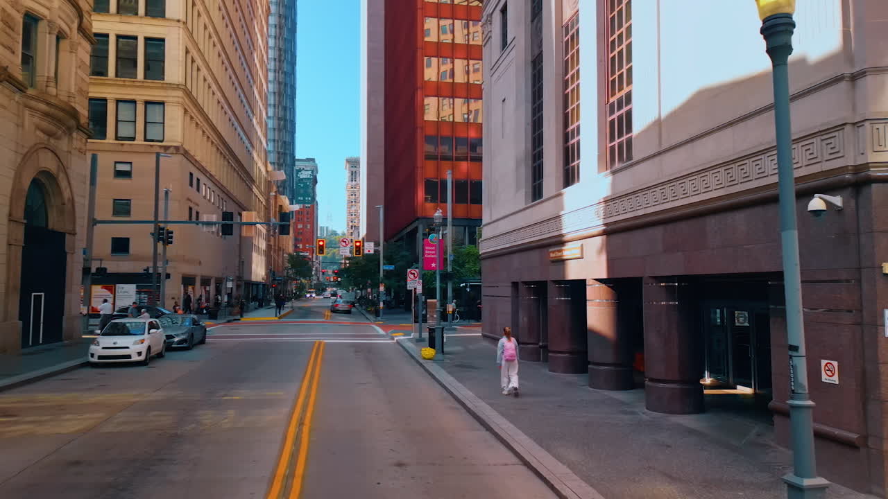 Wide streets of modern lively city. Walk among the high-rises of Pittsburg, Pennsylvania, USA