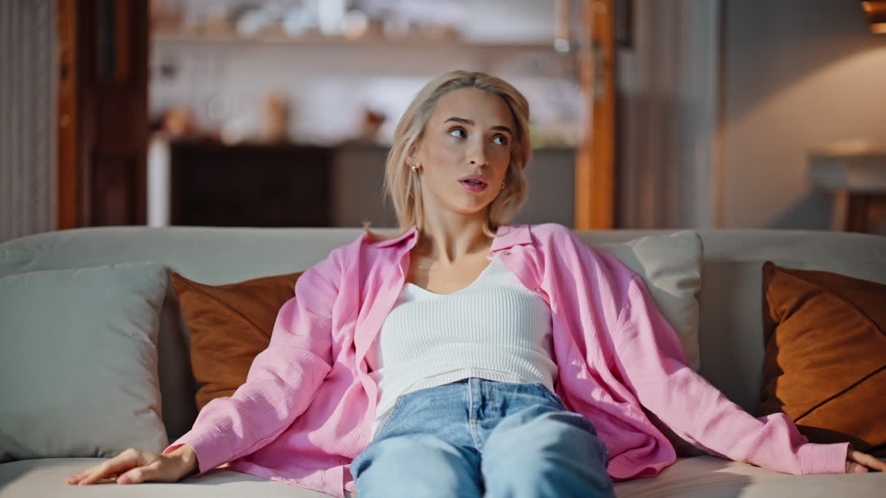 Tired blonde falling coach feeling exhausted closeup. Woman having migraine