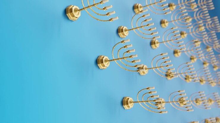 Golden Menorahs on a Vibrant blue Background vertical