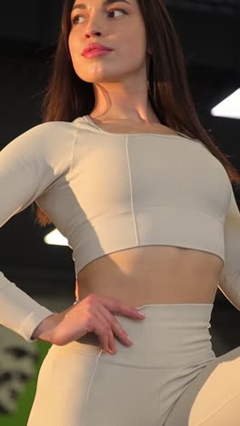 woman in beige workout outfit