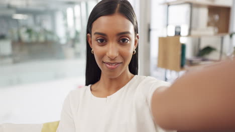 Business-woman-influencer-on-video-call-in-office