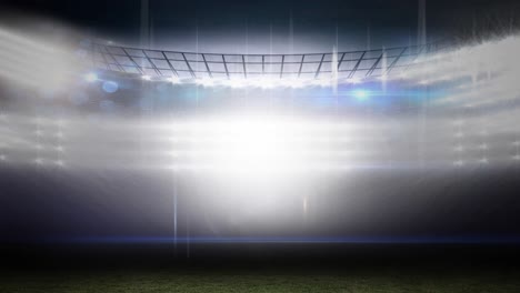 animation of blurred moving lights and bokeh light spots at floodlit sports stadium