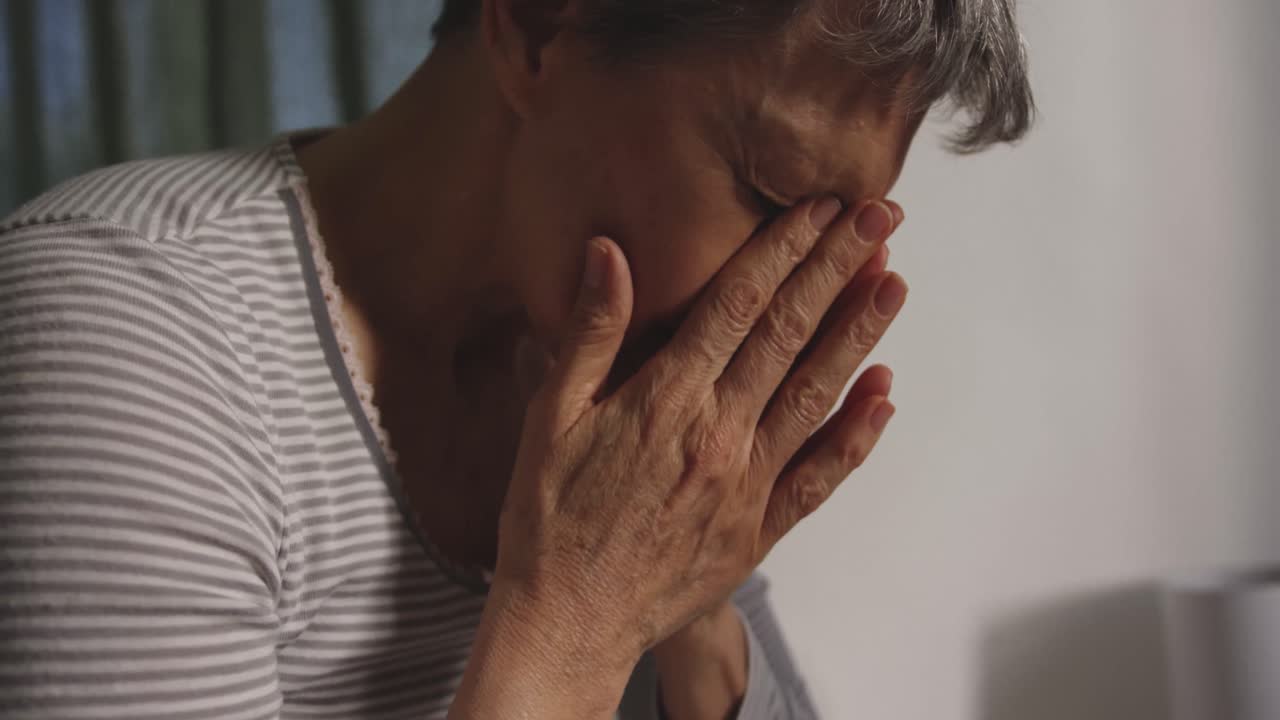 Senior woman at home alone