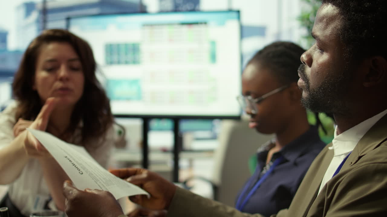 Important business investor studying development progress reports on tablet