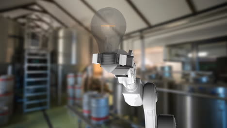 robotic arm catching a light bulb in a warehouse