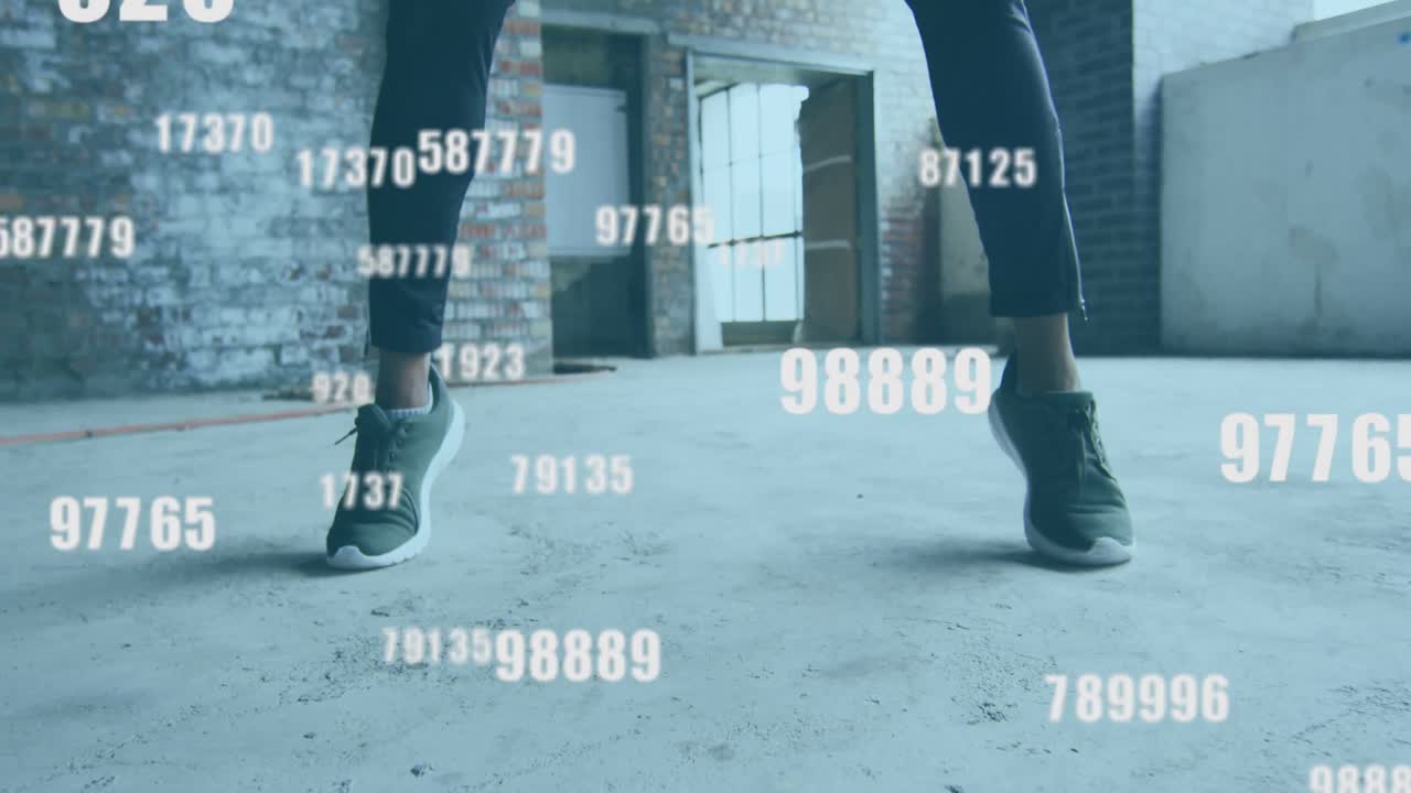 Animation of floating numbers over man exercising with a ball