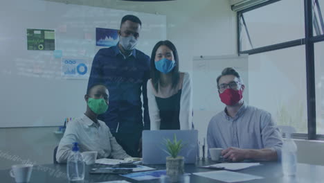 animation of data processing over diverse business people with face masks using laptop