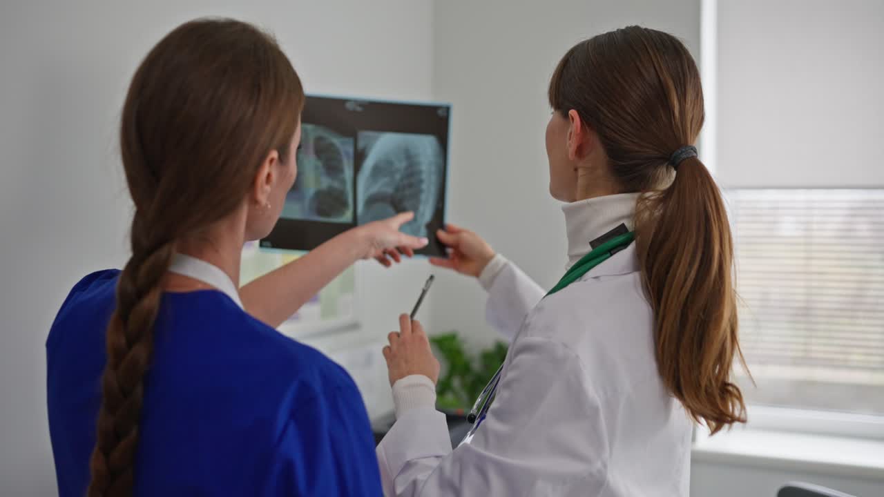 Doctors reviewing an X-ray