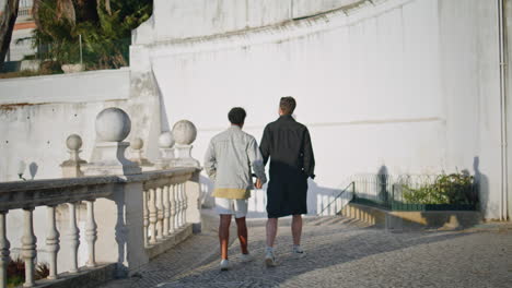 couple walking through a beautiful european city