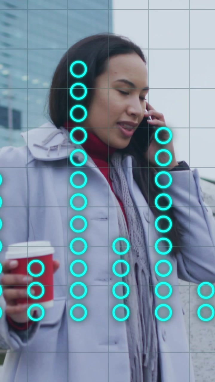 Animation of data processing over woman using smartphone