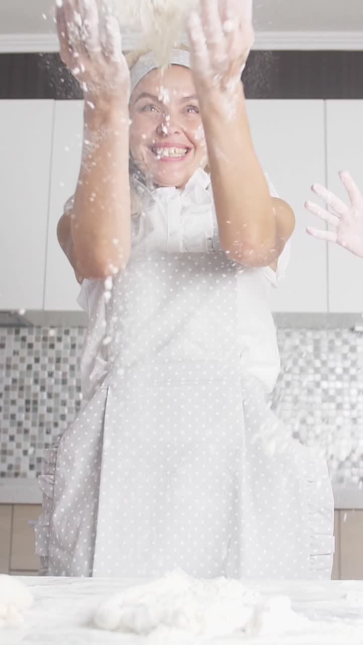 Woman Baking and Flouring in Kitchen