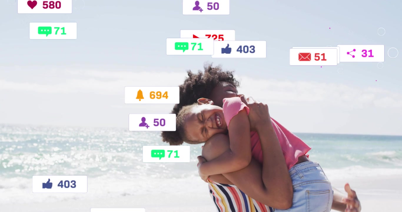 Woman lifting child hugging on beach, bonding, hug causing social media badges growing around them