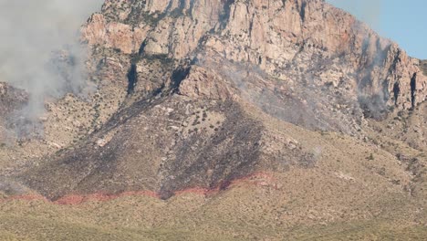 Timelapse-of-Bush-Fire-Smoke-on-Mountain-Hills-on-Sunny-Day,-Climate-Change-and-Air-Pollution-Concept