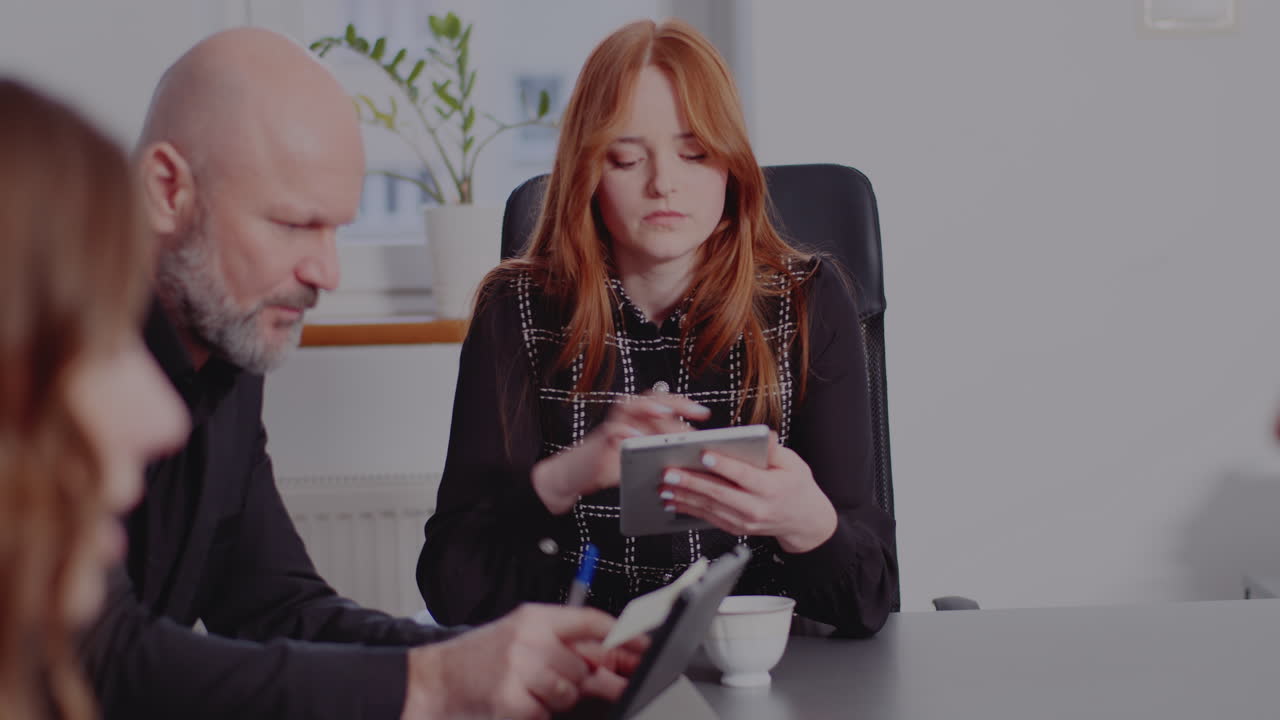 Business meeting with technology