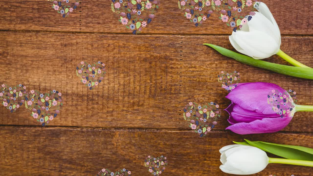 Animation of hearts of flowers floating over wooden surface with white and pink tulips