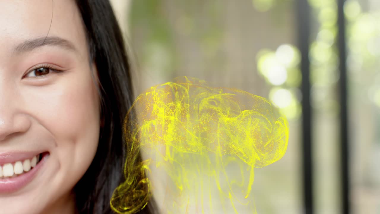 Woman opening one eye, smiling as yellow vapor forms and swirls beside cheek for beauty commercial