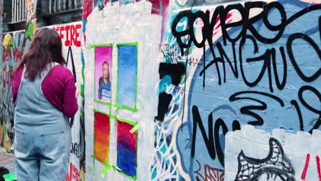 artist creating graffiti on melbourne's iconic street