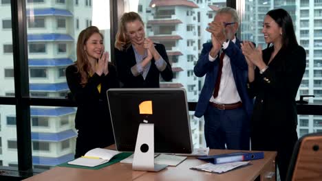 happy business people celebrate victory of success