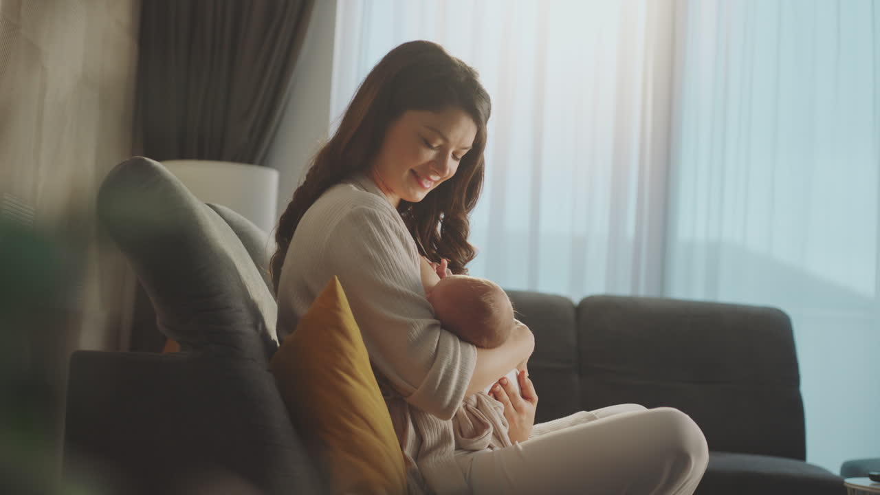 Mother Breastfeeding Newborn Baby