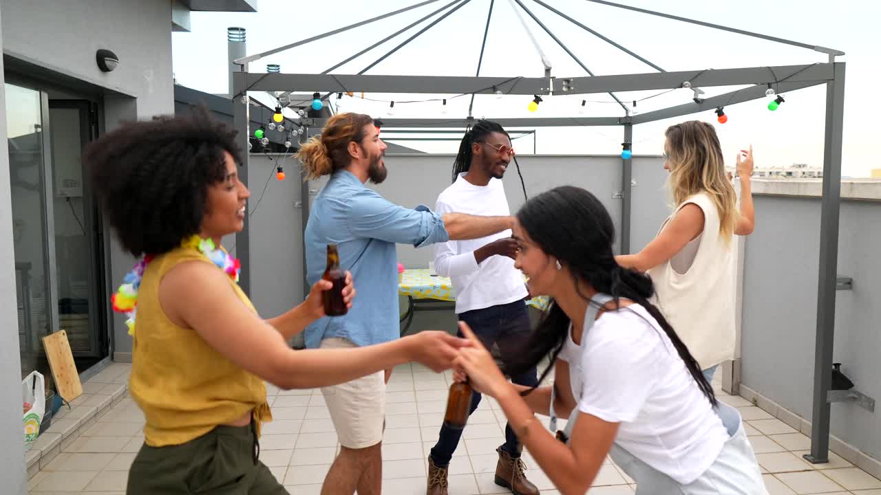 Group of friends celebrating and dancing together