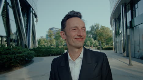 joyful business man walking. closeup view