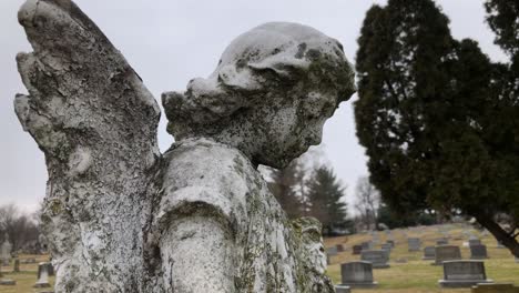 angel on top of gravestone