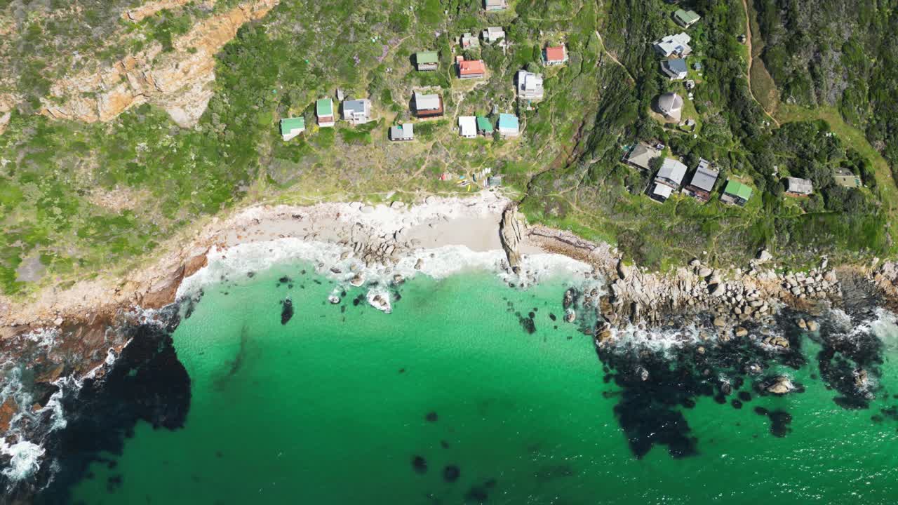 Top-down view of houses along a coastal shoreline in South Africa
