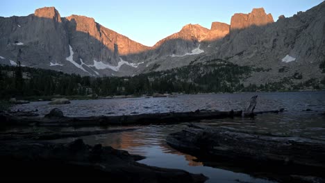 tilt up to dramatic landscape of cirque of the towers as the sun sets in the wind river wilderness